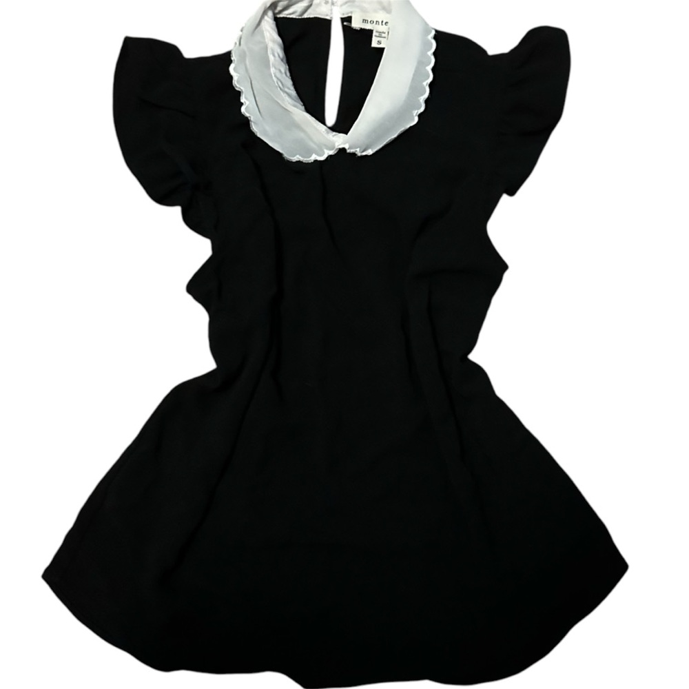 vintage black flowy blouse with white collar and ruffled sleeves